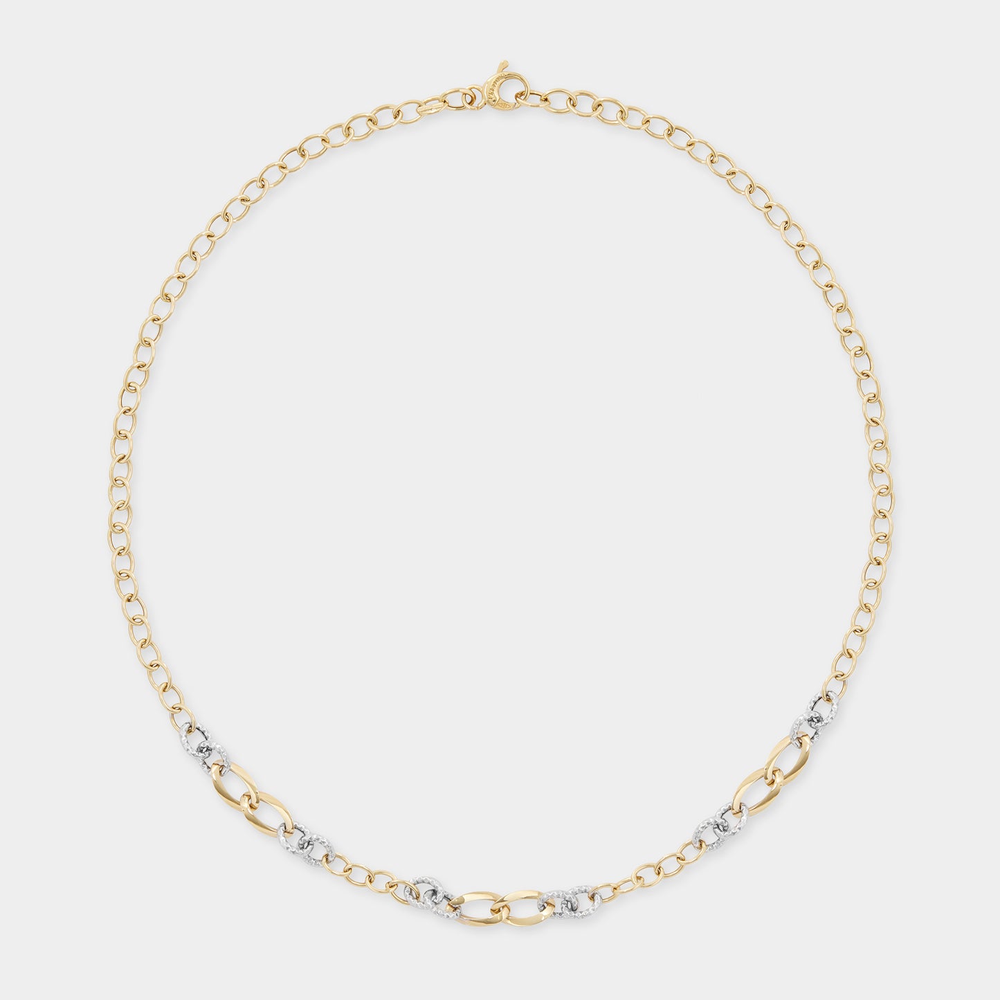 18 K White Gold and Yellow Gold All round loop rings