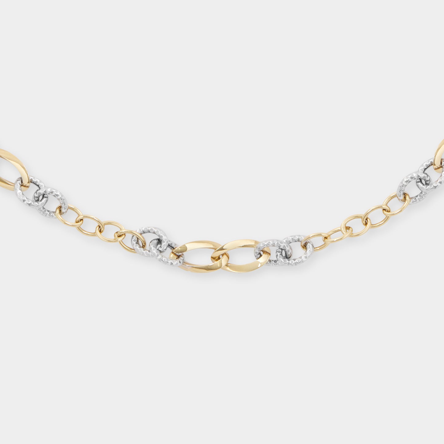 18 K White Gold and Yellow Gold All round loop rings