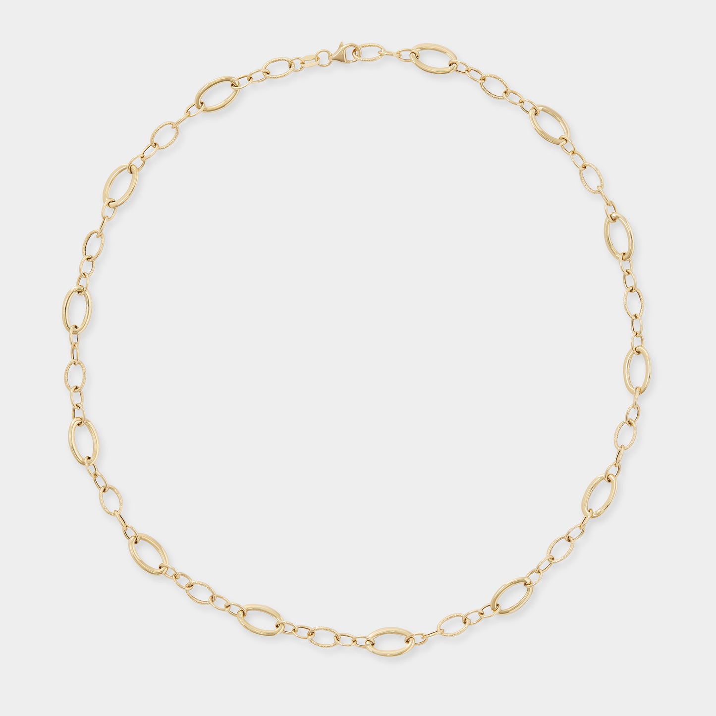18 K Yellow Gold All round oval loop rings