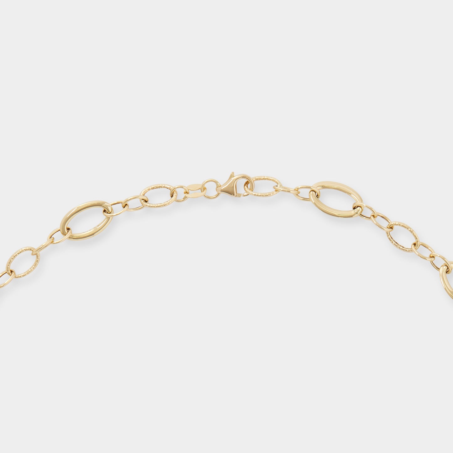 18 K Yellow Gold All round oval loop rings