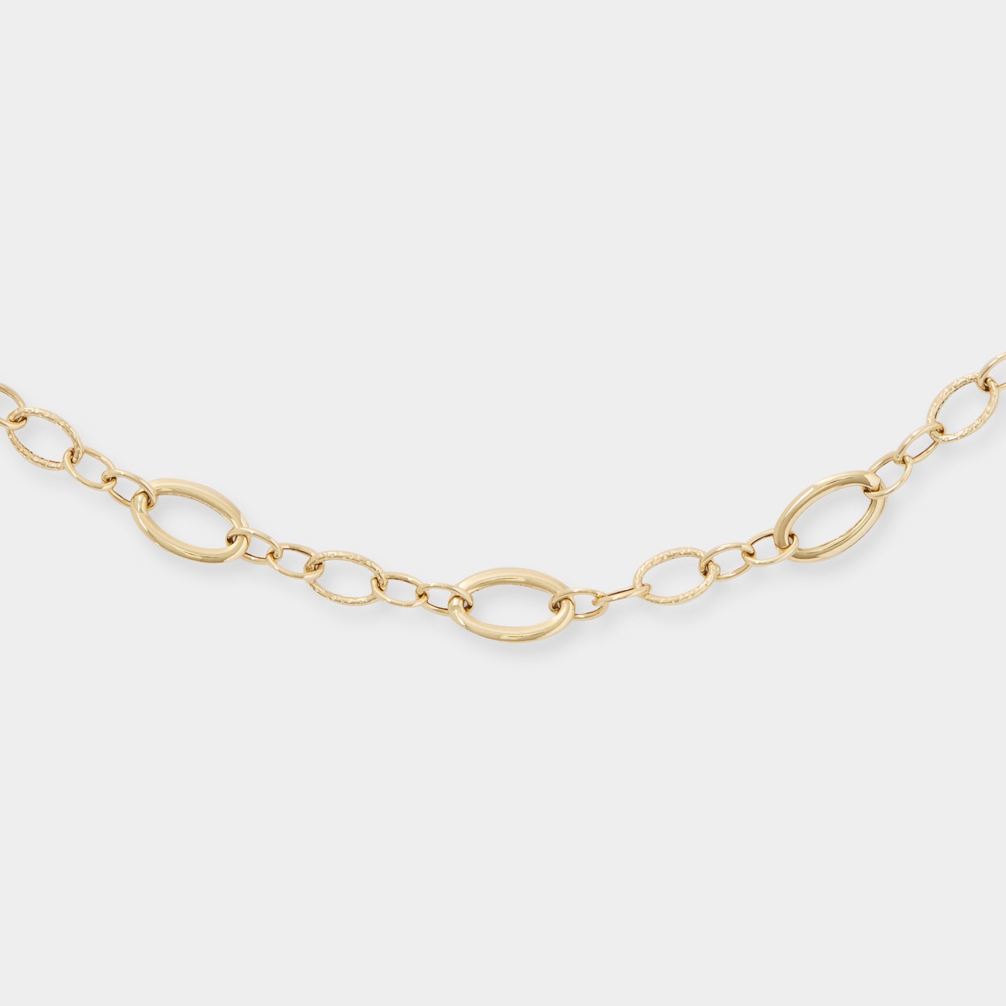 18 K Yellow Gold All round oval loop rings