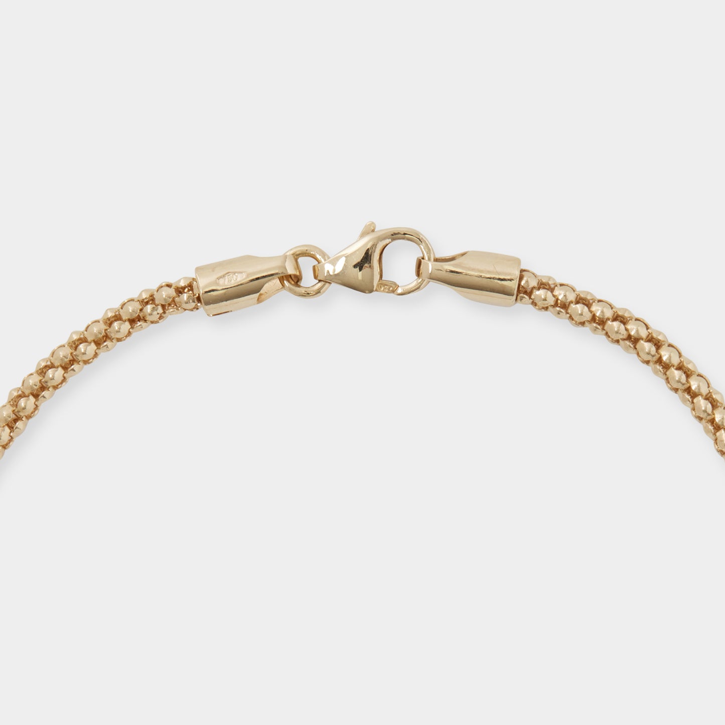 18 K Yellow gold round mesh tube snake style