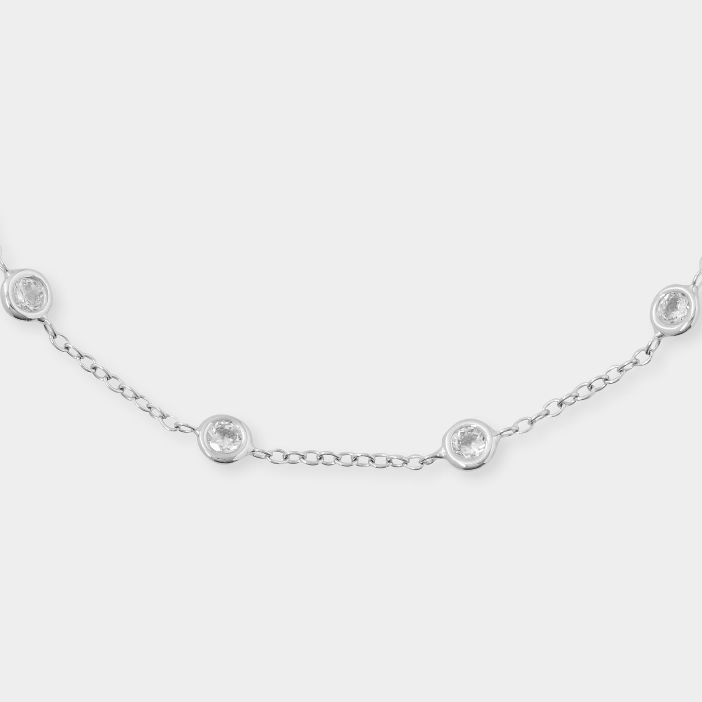 18 K White Gold loop chain and White Sapphire