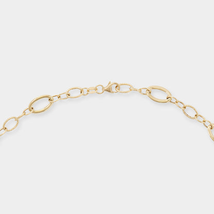 18 K Yellow Gold All round oval loop rings