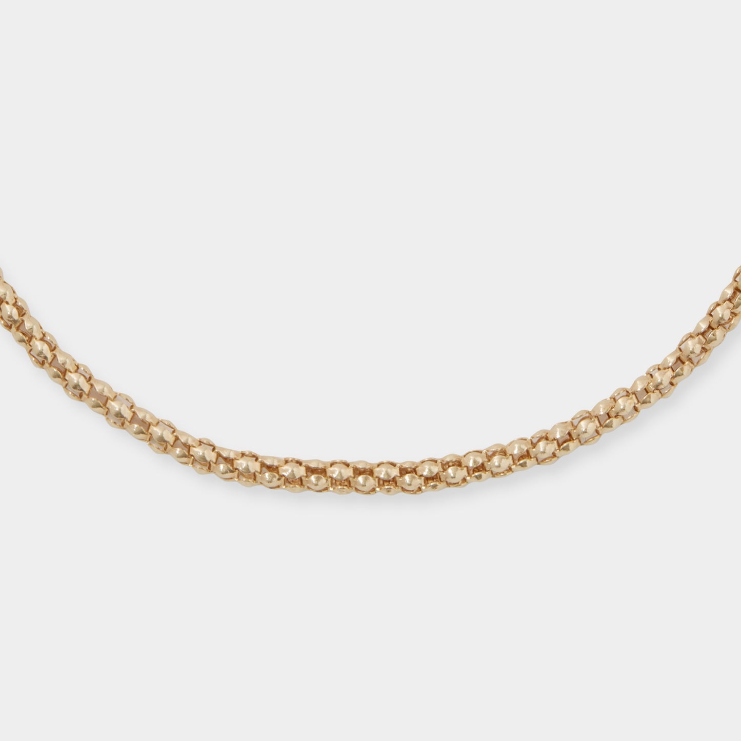 18 K Yellow gold round mesh tube snake style